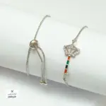 انسيال شداد بلاتين مع فصوص زرقون فضي شكل 3 - ACWS16